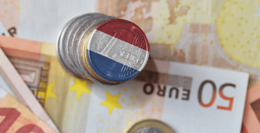 Euro Notes and Coin in colours of netherland flag.