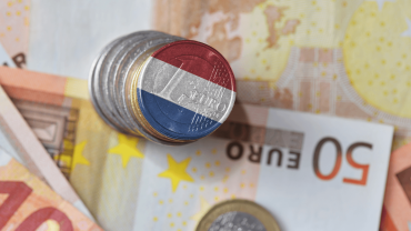 Euro Notes and Coin in colours of netherland flag.