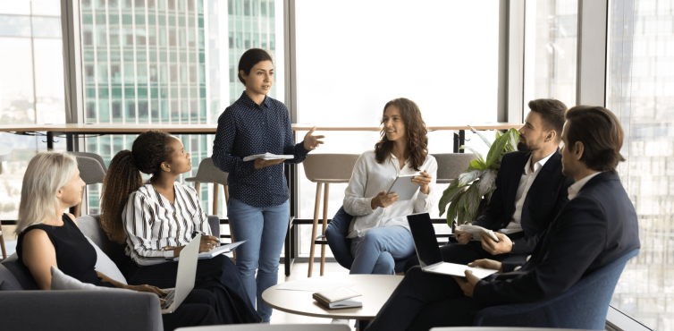 Community of young professional engaging in conversation